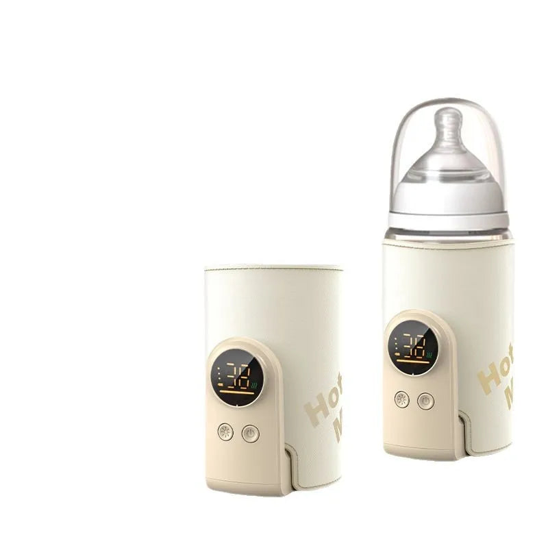 Baby bottle warmer and bottle on a white background