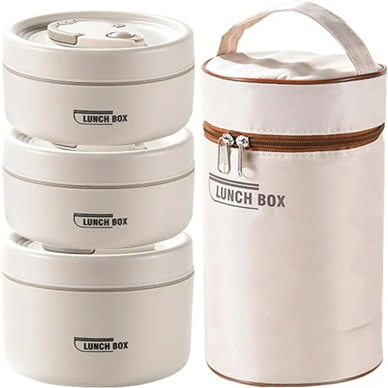 Set of three stacked lunch boxes with a insulated lunch bag on a white background